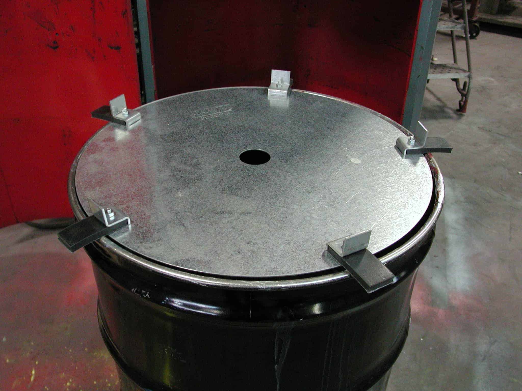 Pak-More Hold-Down Disks prevent waste springback. Lower Drum Compacting Costs.