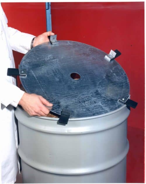 Pak-More Hold Down Disk improves the volume reduction when compacting debris inside a 55-gallon drum
